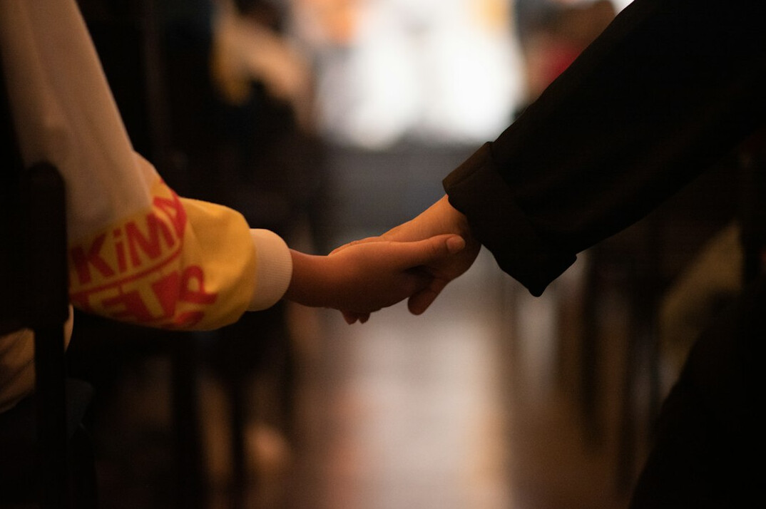 Two professionals shaking hands after a negotiation