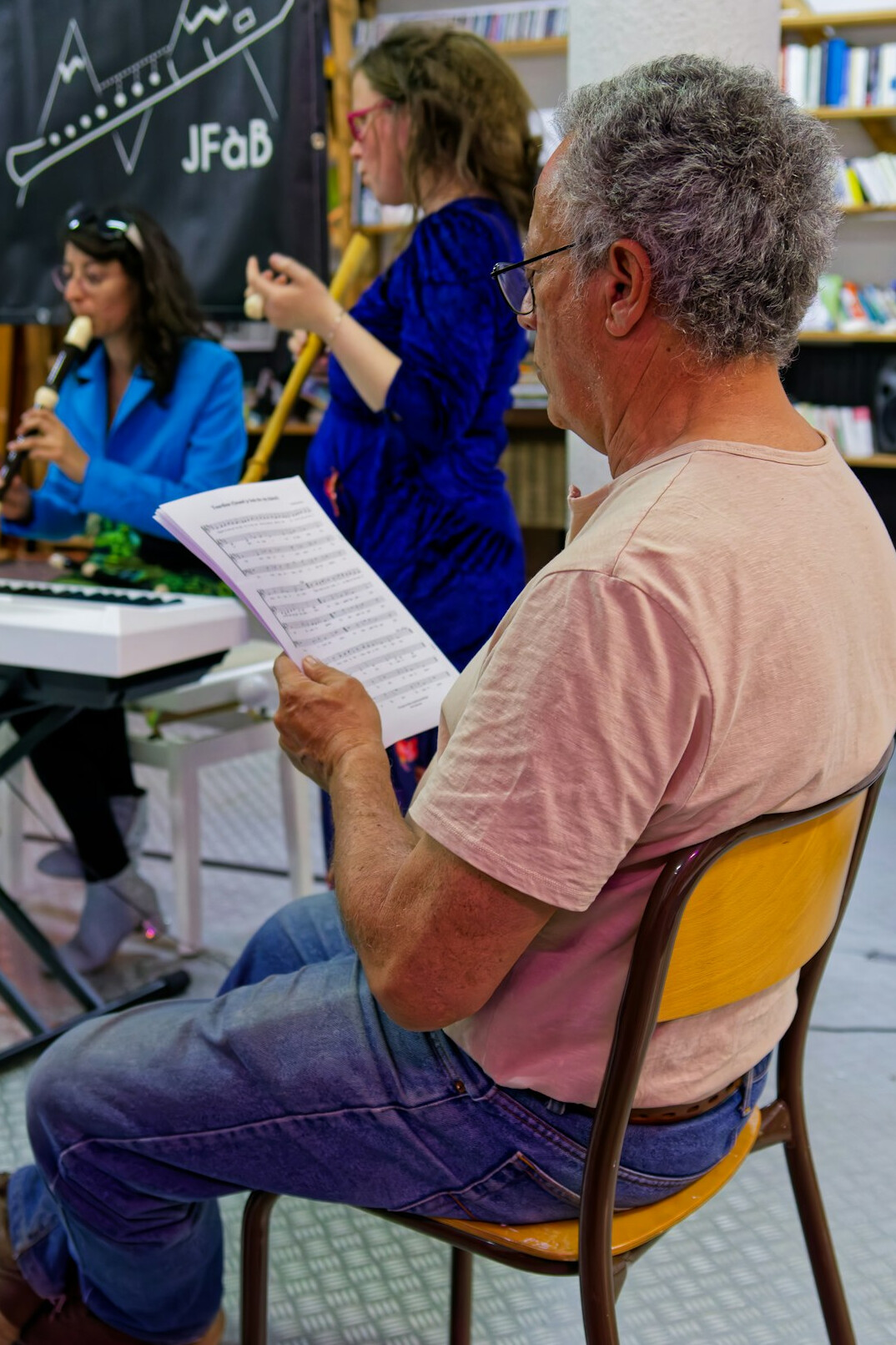 Instructor teaching a class of adult learners